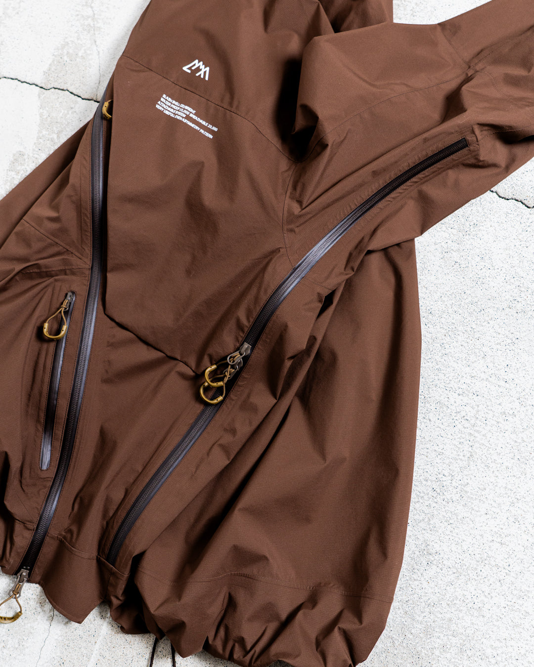 CMF OUTDOOR GARMENT SLASH SHELL COEXIST BRIGHT