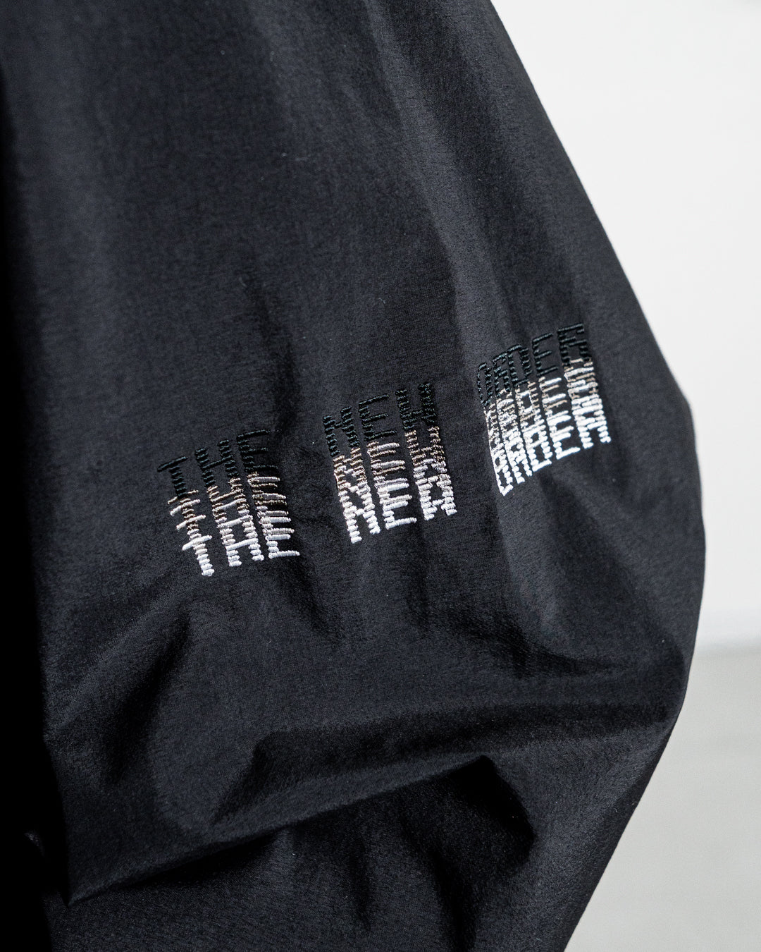 【collaboration】ES.1 × THE NEW ORDER magazine F001 TNO Nylon Jacket