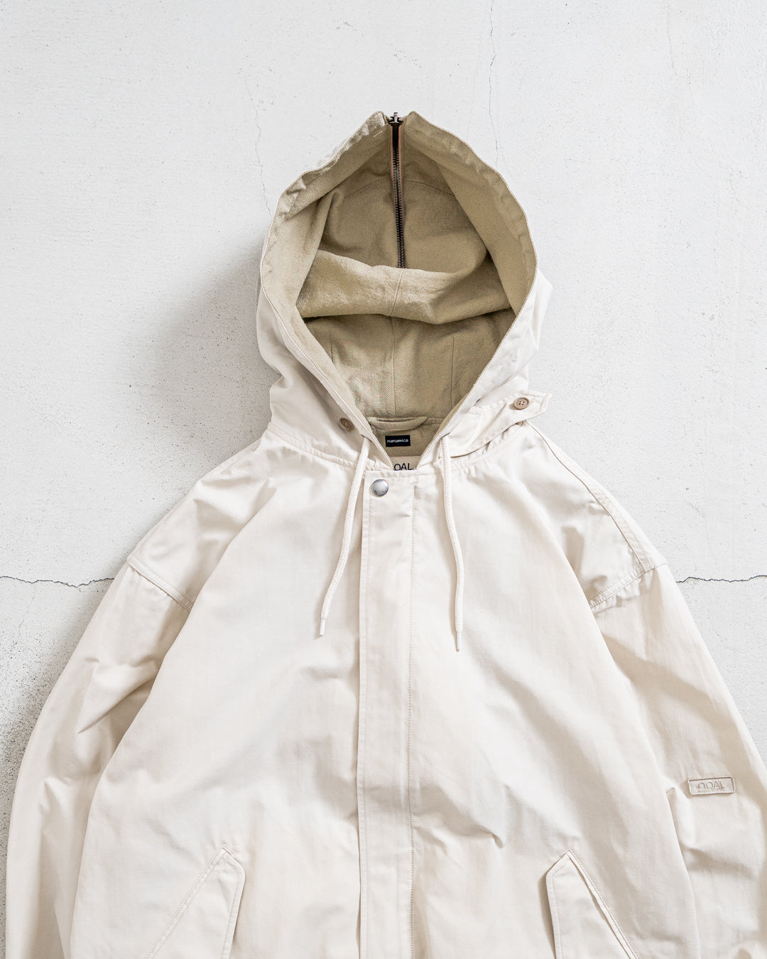 通販] Tnanamica (ナナミカ) Nylon Twill Hooded Jacket 商品ページ