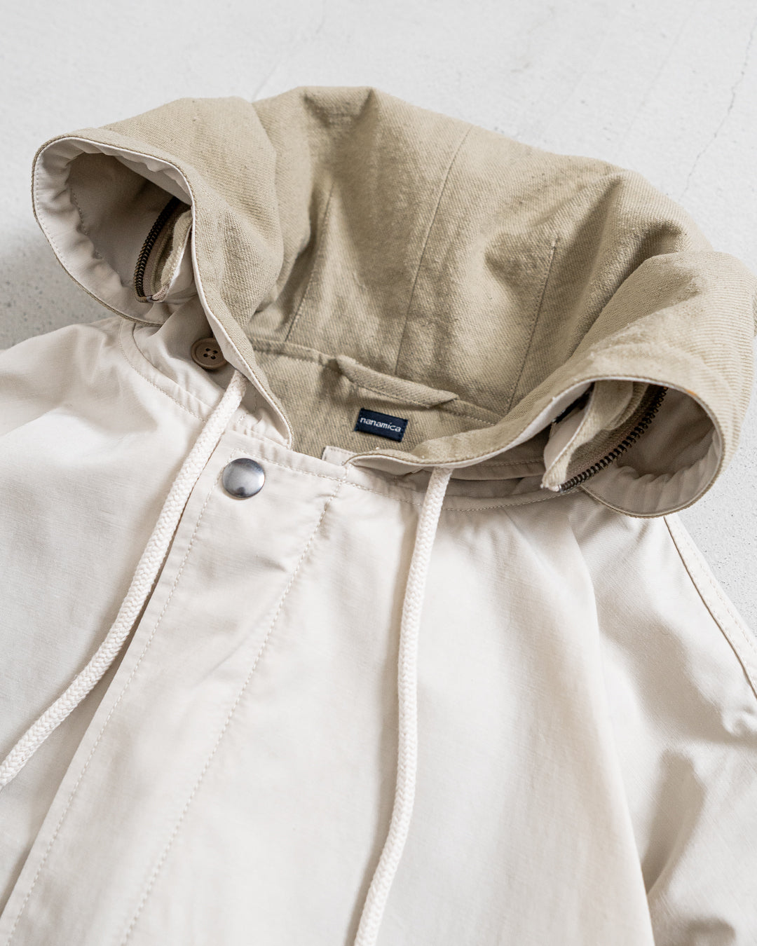通販] Tnanamica (ナナミカ) Nylon Twill Hooded Jacket 商品ページ