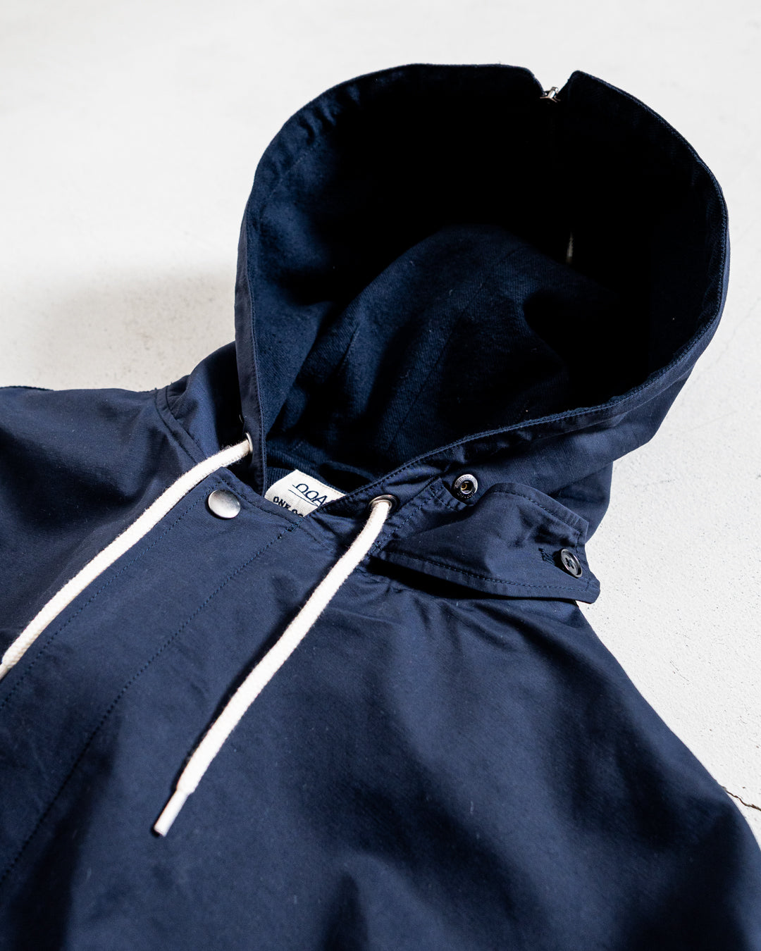 通販] Tnanamica (ナナミカ) Nylon Twill Hooded Jacket 商品ページ