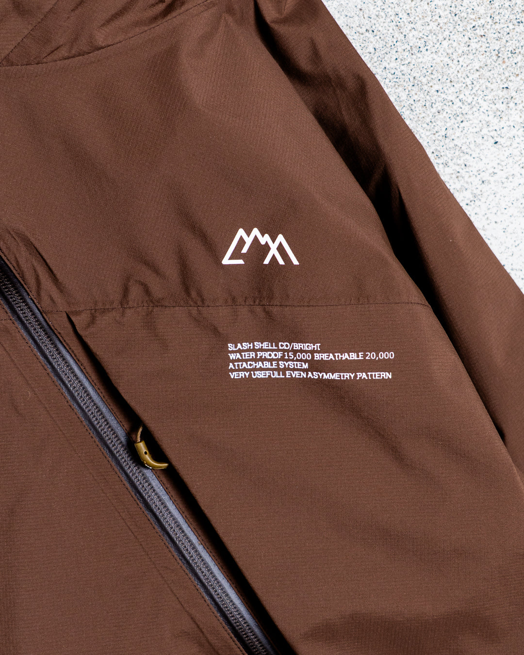 CMF OUTDOOR GARMENT SLASH SHELL COEXIST BRIGHT
