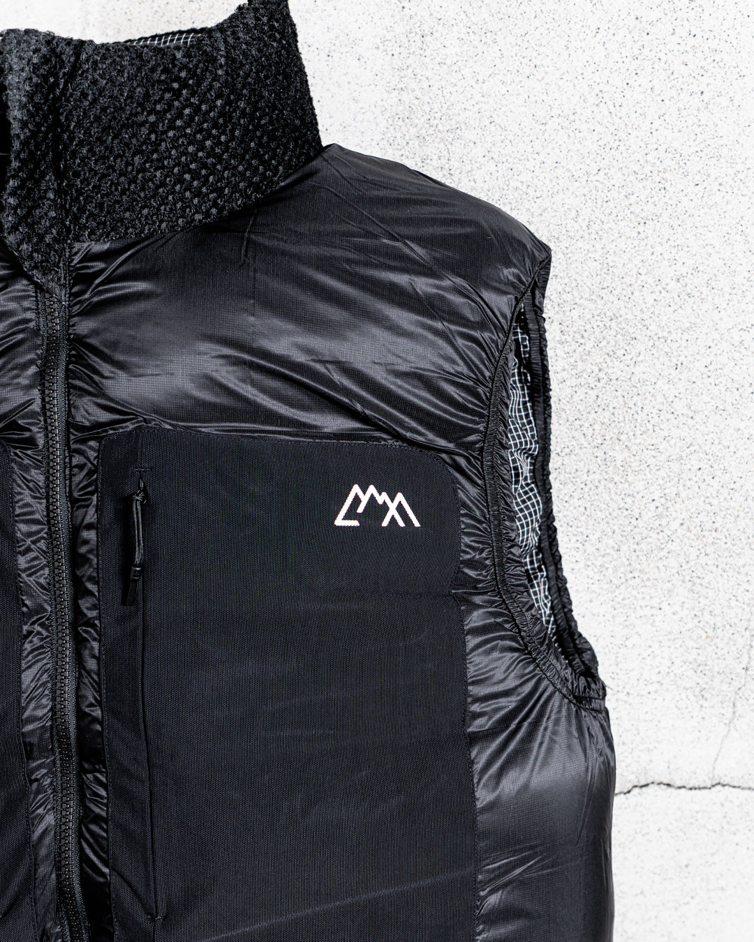 CMF OUTDOOR GARMENT NOMAD DOWN VEST COEXIST