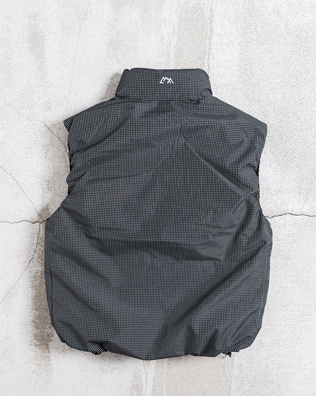 CMF OUTDOOR GARMENT NOMAD DOWN VEST COEXIST