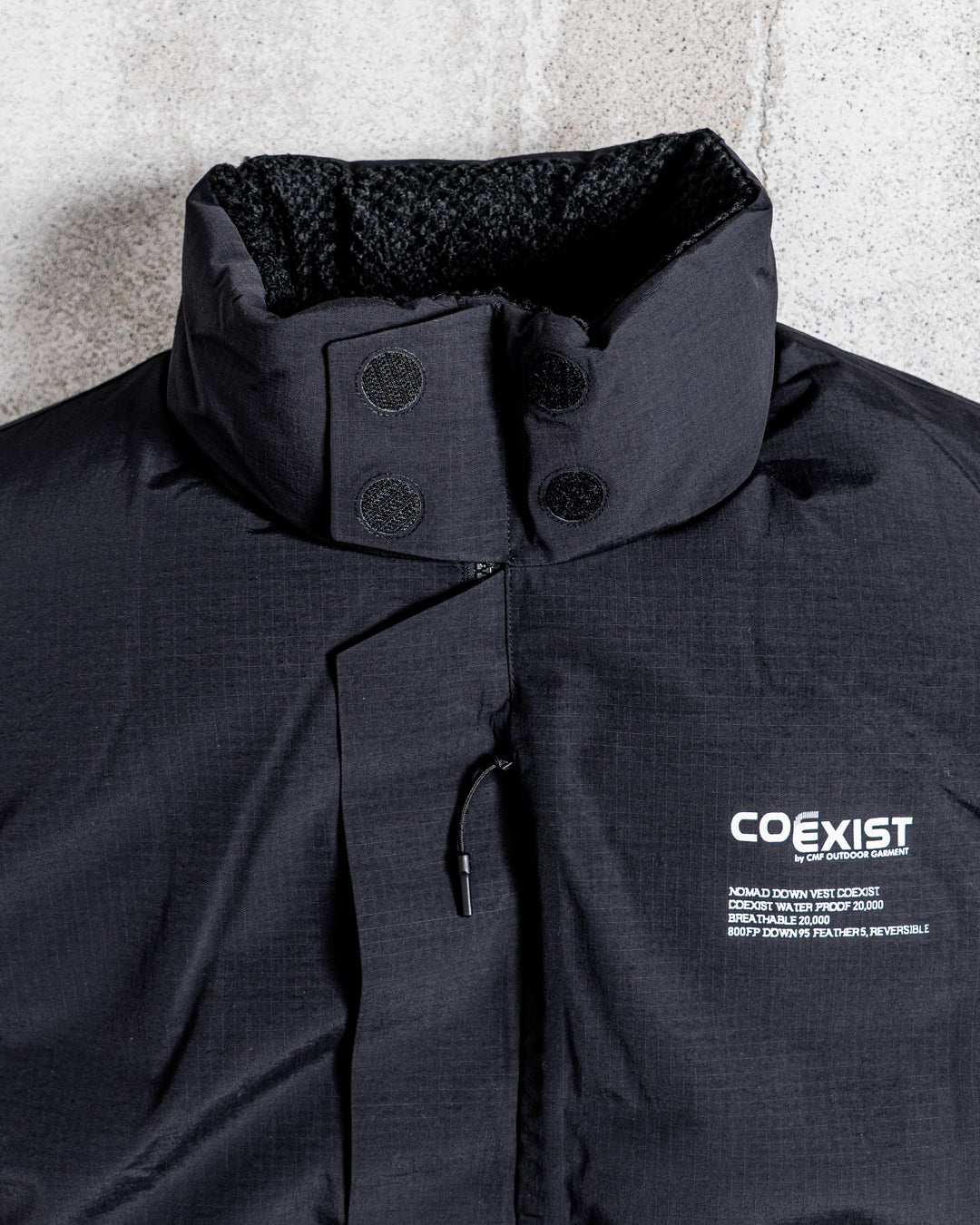 CMF OUTDOOR GARMENT NOMAD DOWN VEST COEXIST