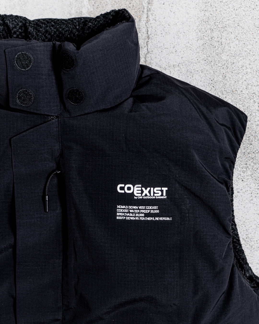 CMF OUTDOOR GARMENT NOMAD DOWN VEST COEXIST