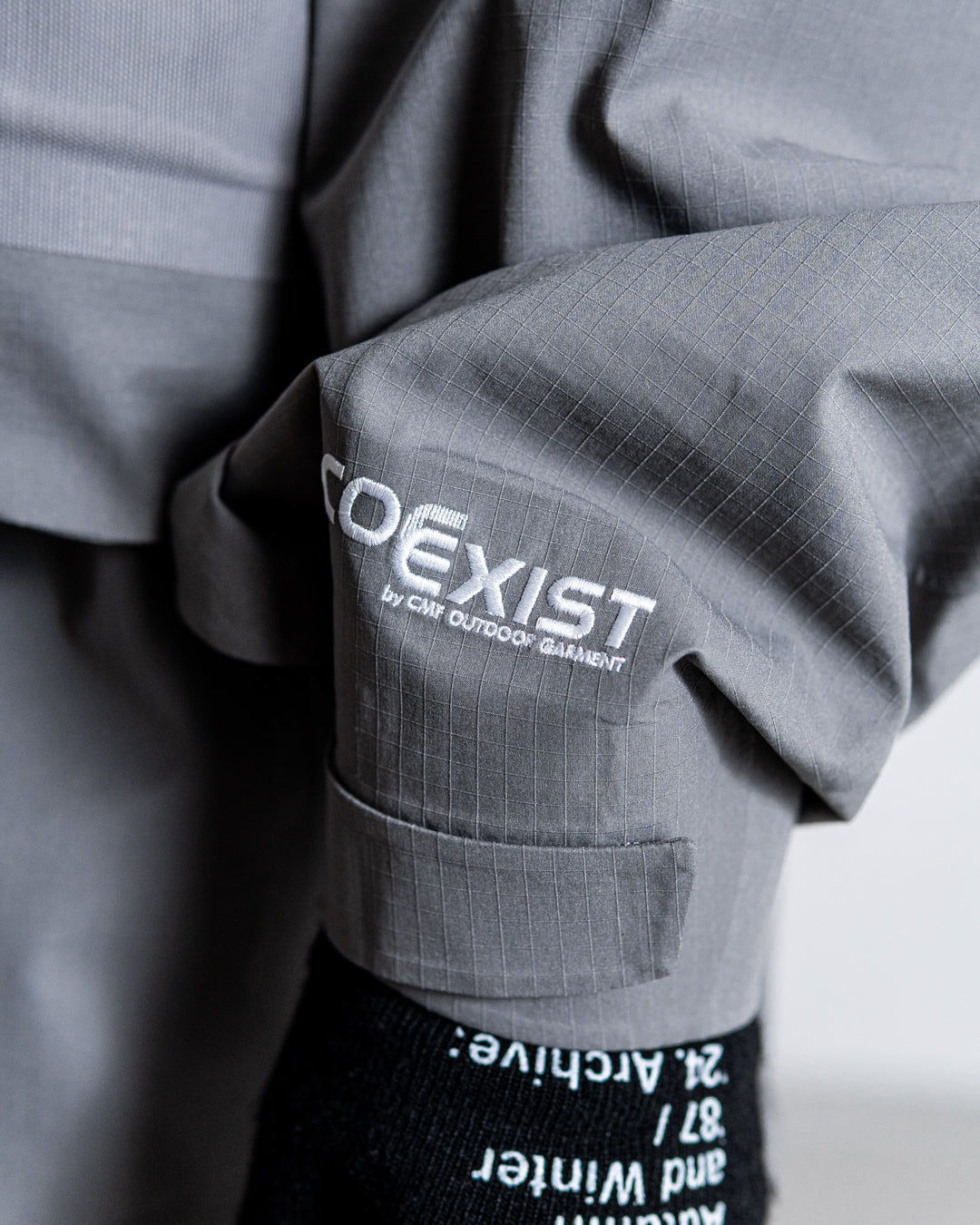 CMF OUTDOOR GARMENT MID NIGHT SHELL COEXIST