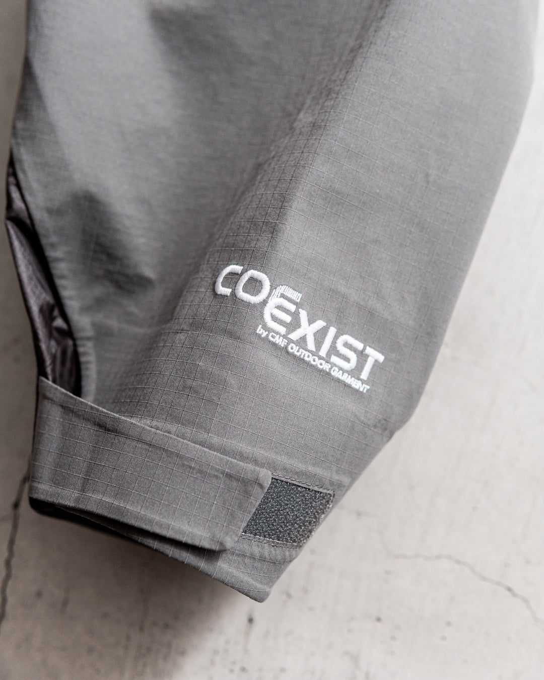 CMF OUTDOOR GARMENT MID NIGHT SHELL COEXIST