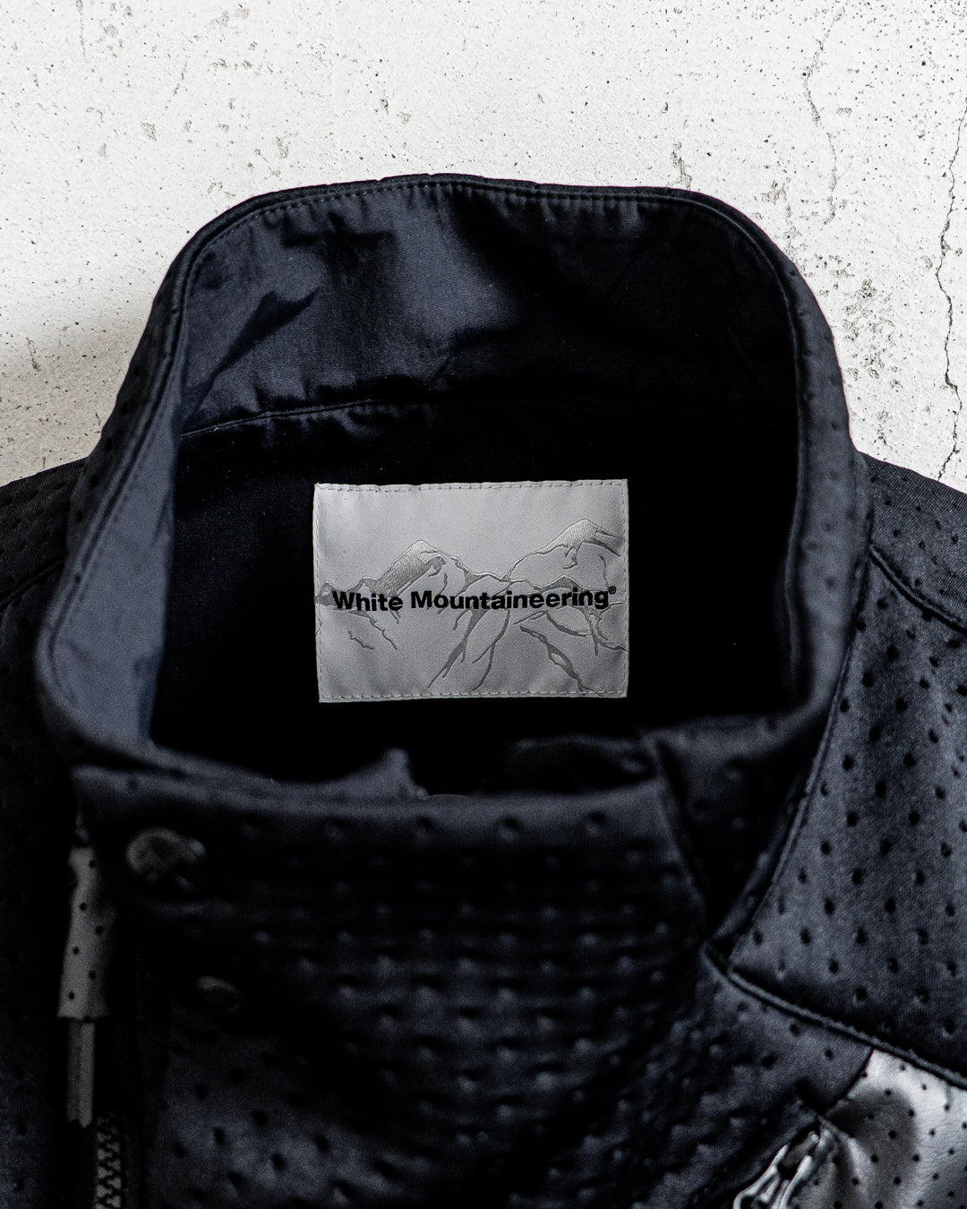 White Mountaineering PUNCHING ASYMMETRY VEST