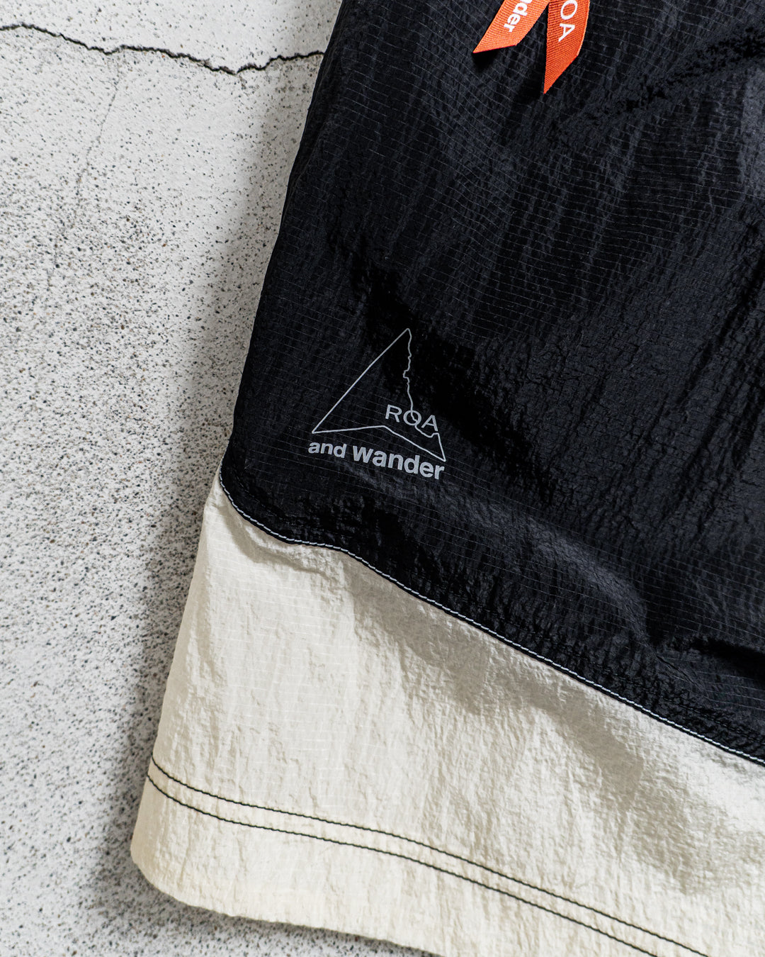 【collabolation】ROA × and wander ripstop wind short pants