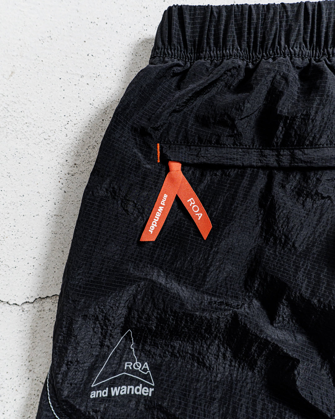 【collabolation】ROA × and wander ripstop wind short pants