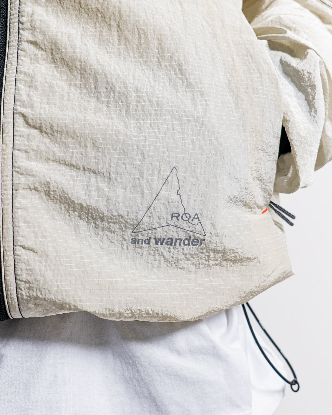 【collabolation】ROA × and wander ripstop wind jacket
