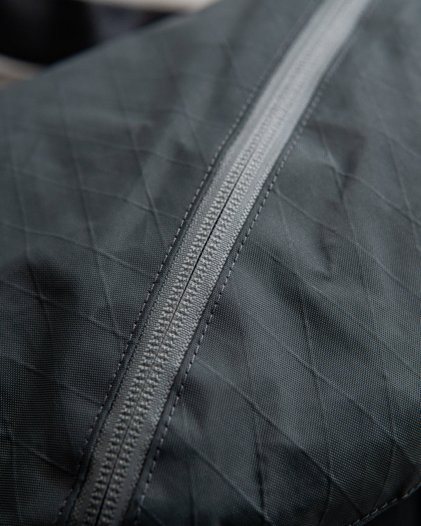 CMF OUTDOOR GARMENT MESSENGER BAG X-PAC