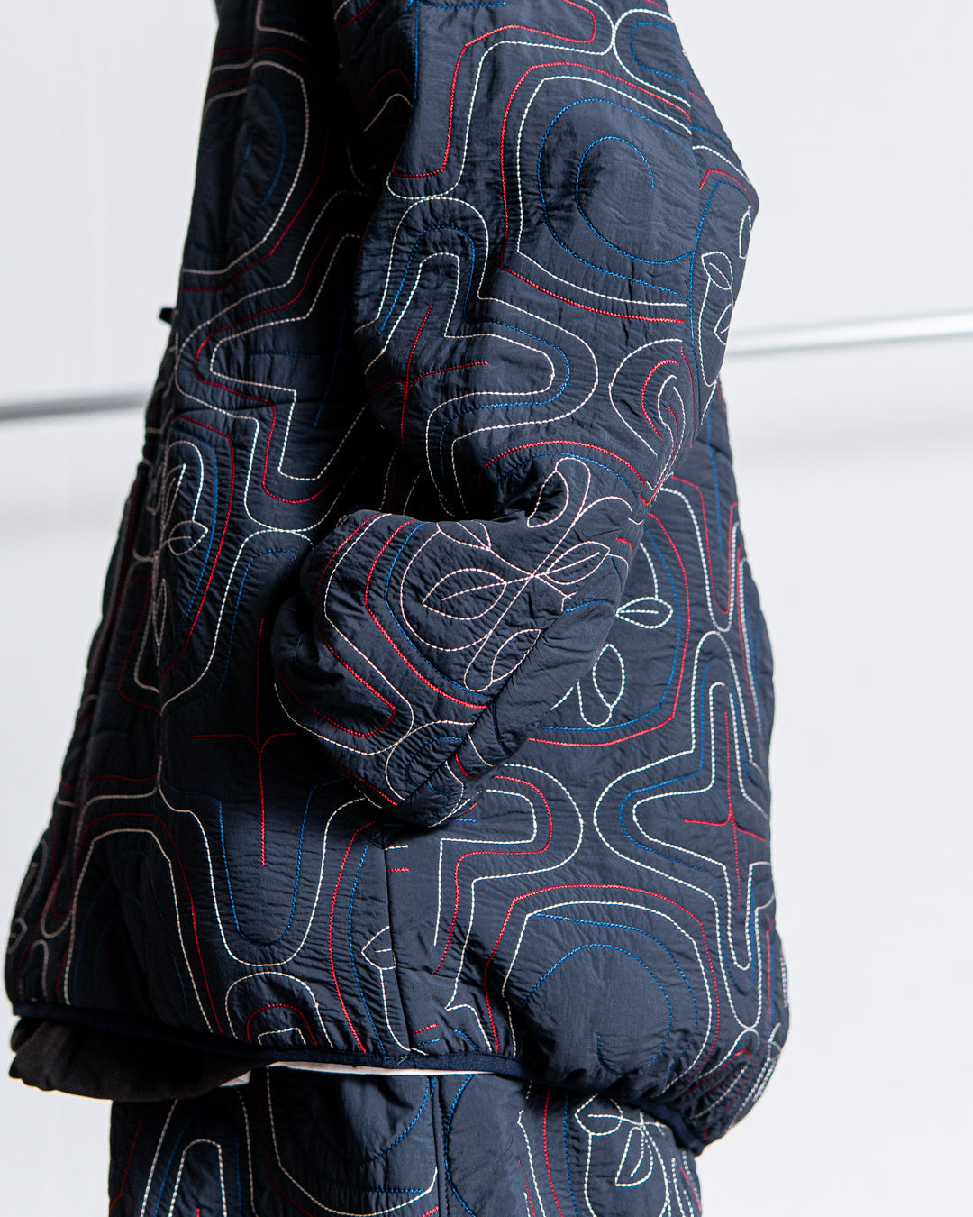 norbit Ainu quilted hood jacket