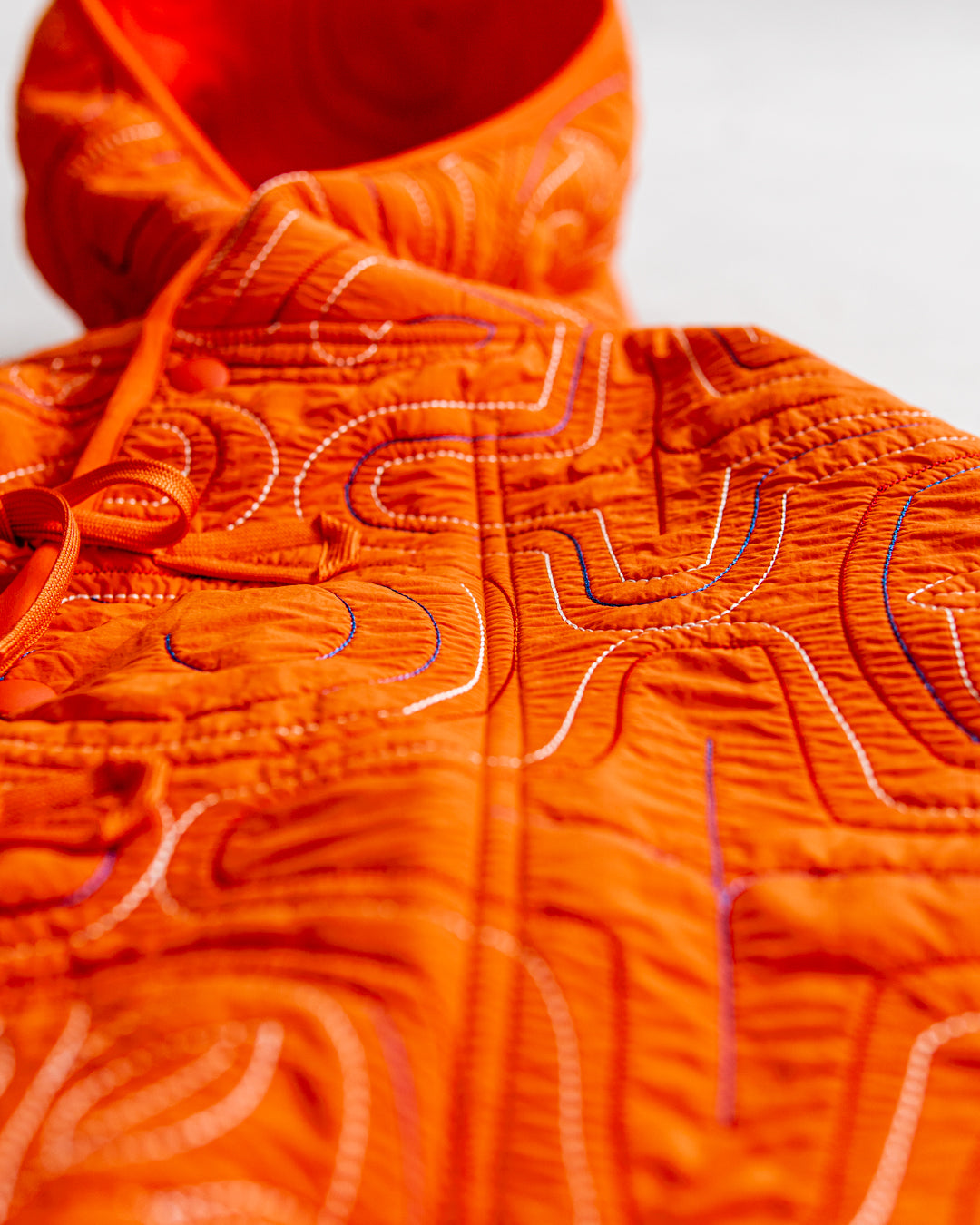 norbit Ainu quilted hood jacket