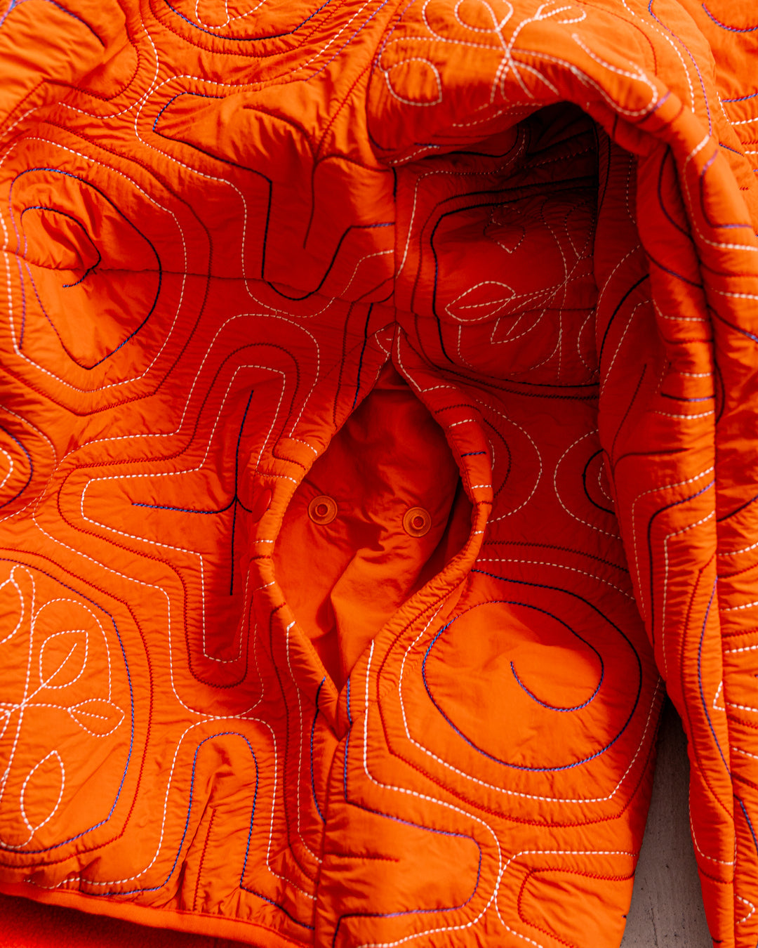 norbit Ainu quilted hood jacket