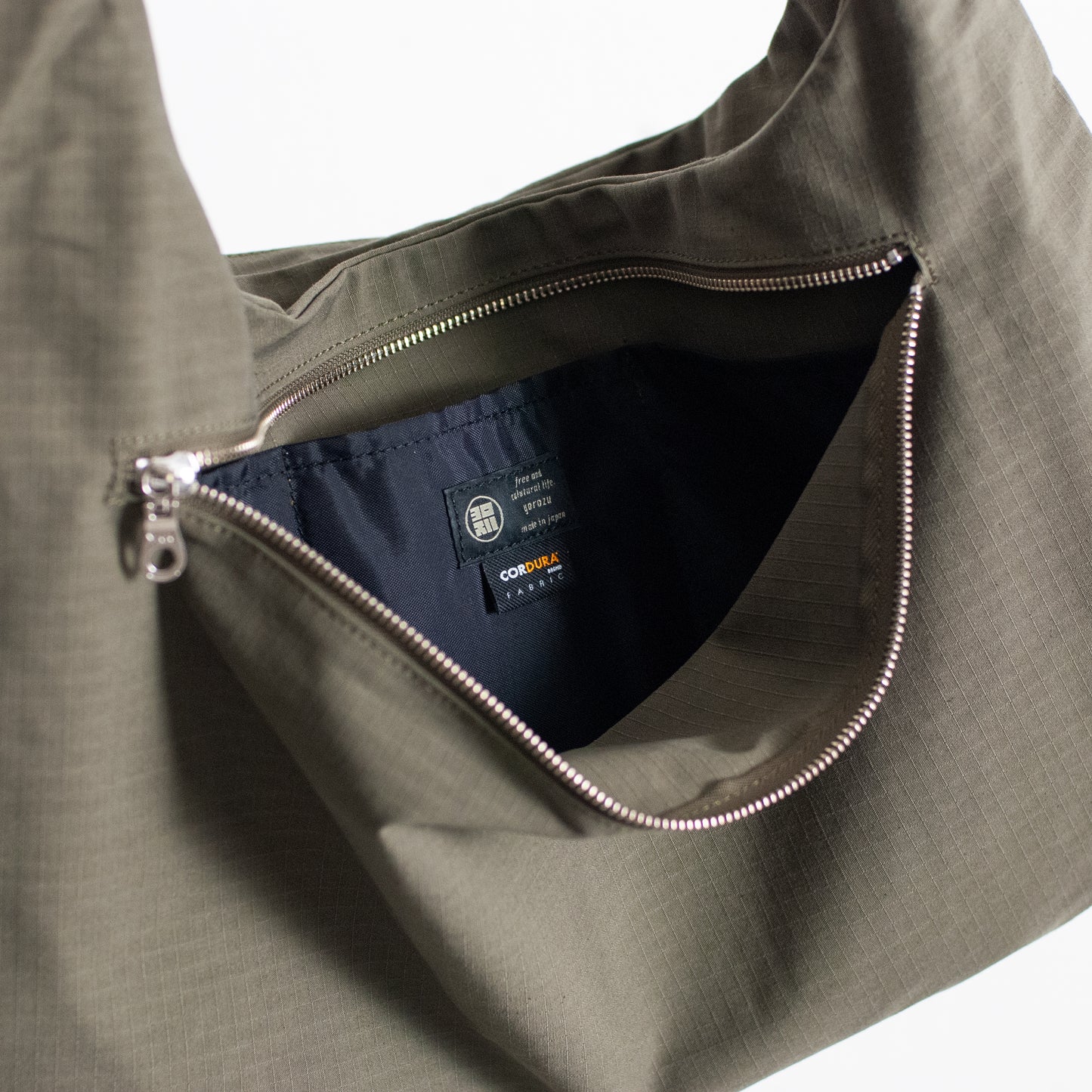 DEFORMATION W "SUEDE TONE" and "CORDURA®"